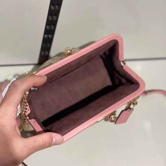 NORA KISSLOCK CROSSBODY IN SIGNATURE CANVAS (COACH C2876)